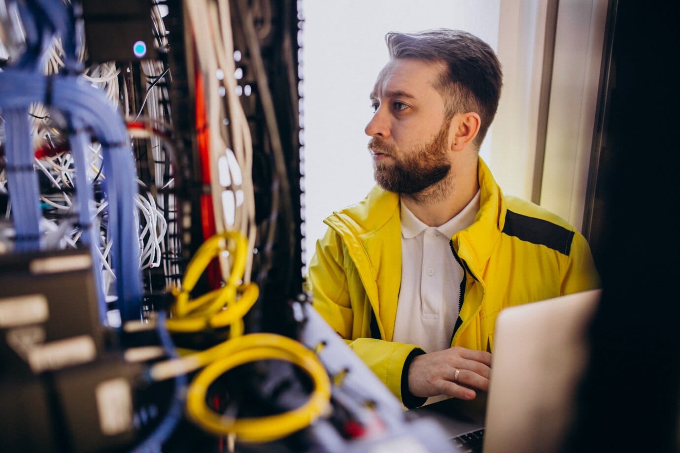 IT technician configuring network equipment for a Connecticut business