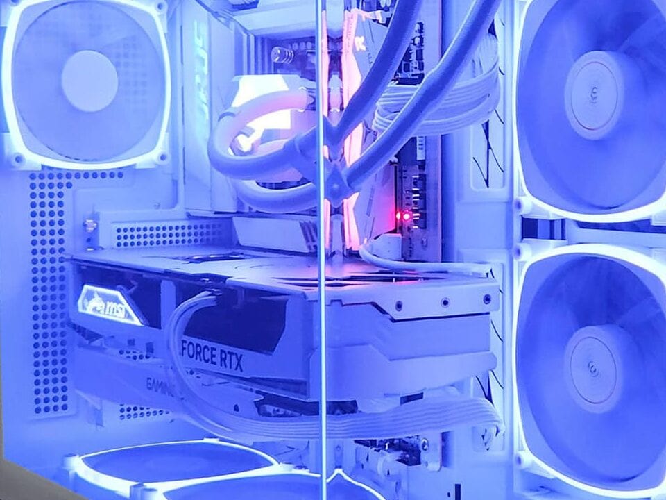 Close view of a graphics card installed in a white gaming PC